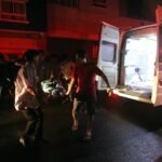 8 ambulances ran like shuttles to take apartment fire victims to the hospital 3